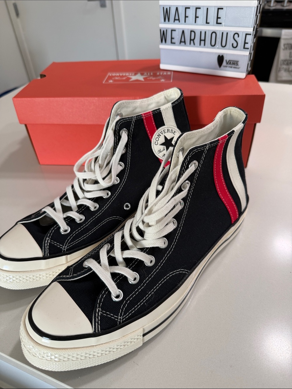 Converse Black High Top Sneakers with Red and White Accents
